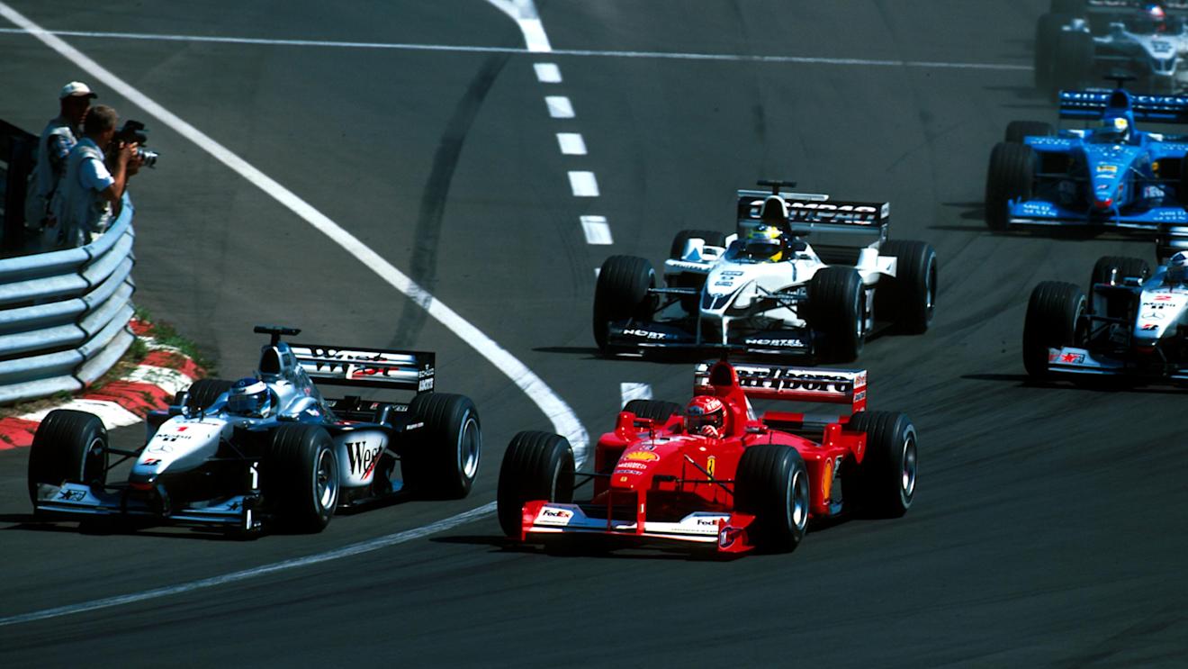 Winner Mika Hakkinen(FIN) Mclaren  MP4-15 gets the jump on Schumacher at the start. Hungarian GP, Hungaroring, 13 August 2000 © Sutton Motorsport Images