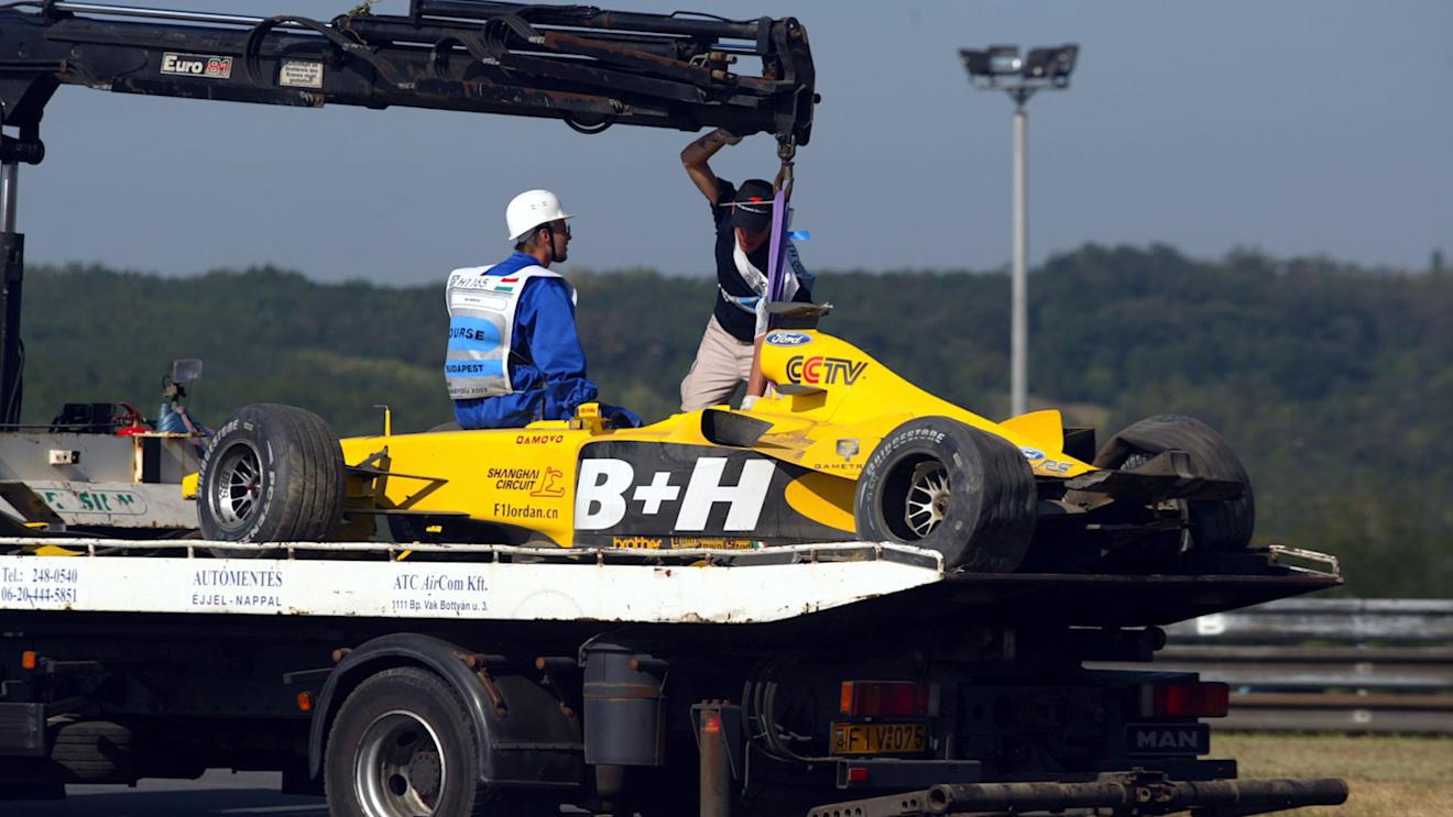 The Jordan Ford EJ13 of Ralph Firman Jnr (GBR)  is returned to the paddock on a truck after his crash that caused the first practice session to be stopped.
Hungarian Grand Prix, Hungaroring, Hungary, 23 August 2003.
DIGITAL IMAGE © © Sutton Motorsport Images