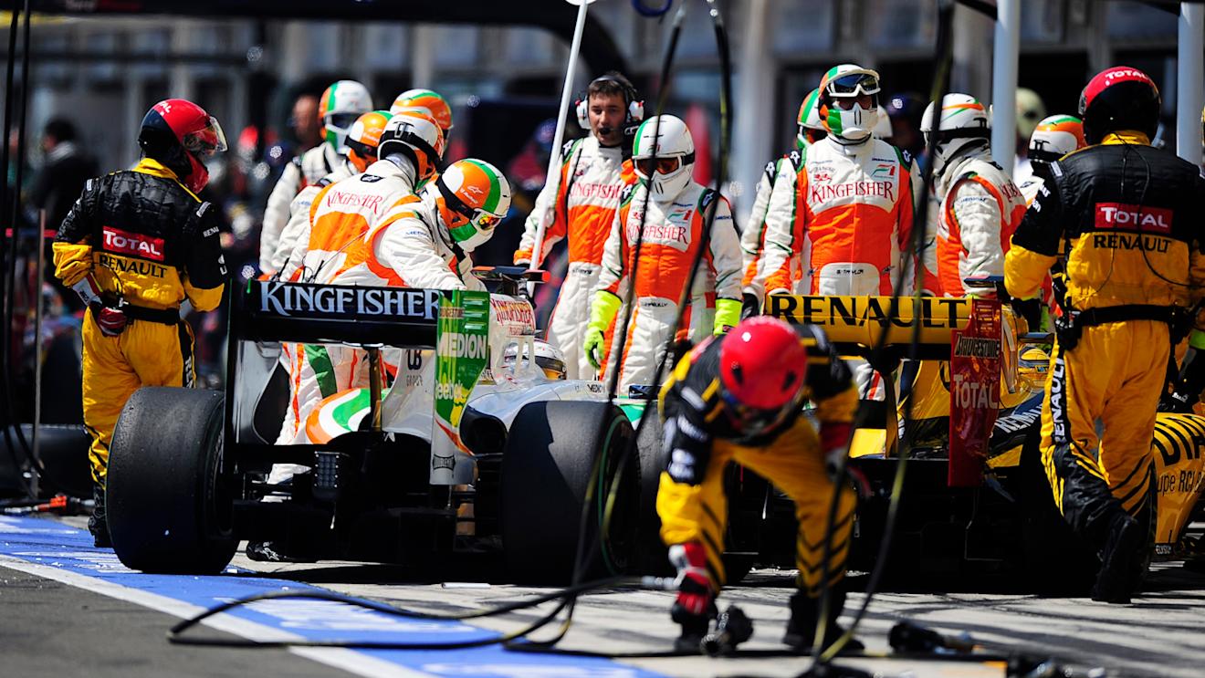 Adrian Sutil (GER) Force India F1 VJM03 and Robert Kubica (POL) Renault R30 collide in the pits. Hungarian Grand Prix, Race, Budapest, Hungary, Sunday 1 August 2010. © © Sutton Motorsport Images