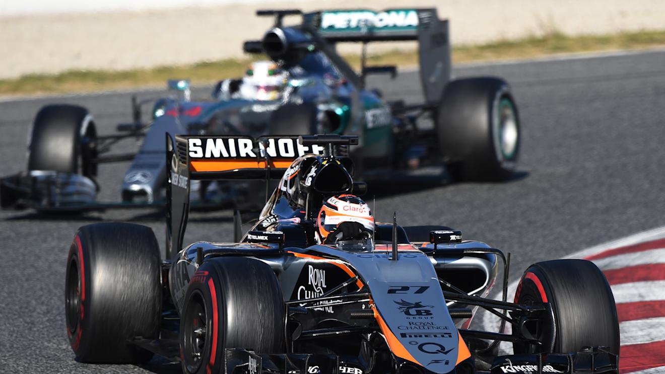 Nico Hulkenberg (GER) Force India VJM08 leads Lewis Hamilton (GBR) Mercedes AMG F1 06 at Formula One Testing, Day Three, Barcelona, Spain, 28 February 2015.