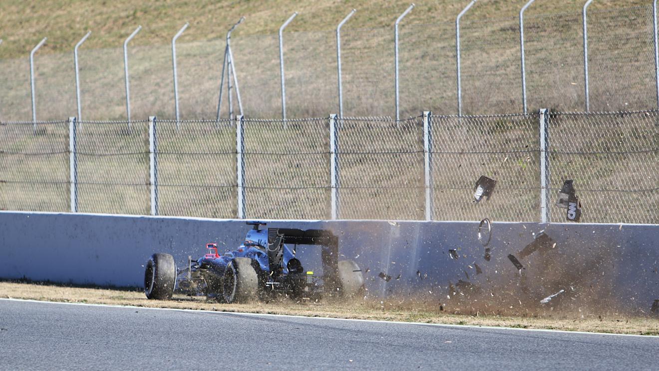 Fernando Alonso (ESP) McLaren MP4-30 crashes at Formula One Testing, Day Four, Barcelona, Spain, 22 February 2015.
