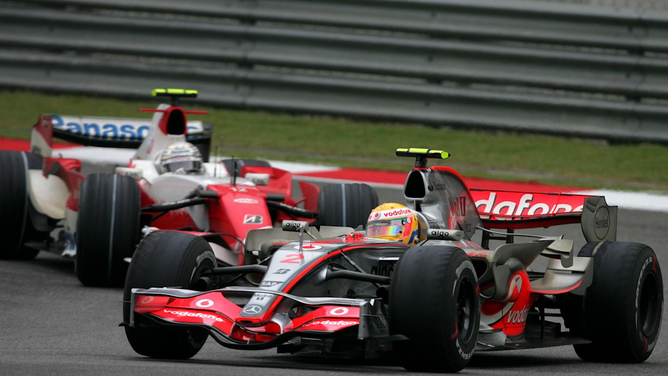 Lewis Hamilton (GBR) McLaren Mercedes MP4/22 ahead of Jarno Trulli (ITA) Toyota TF107 
Formula One World Championship, Rd16, Chinese Grand Prix, Race Day, Shanghai International Circuit, Shanghai, China, Sunday 7 October 2007. © Sutton Motorsport Images
