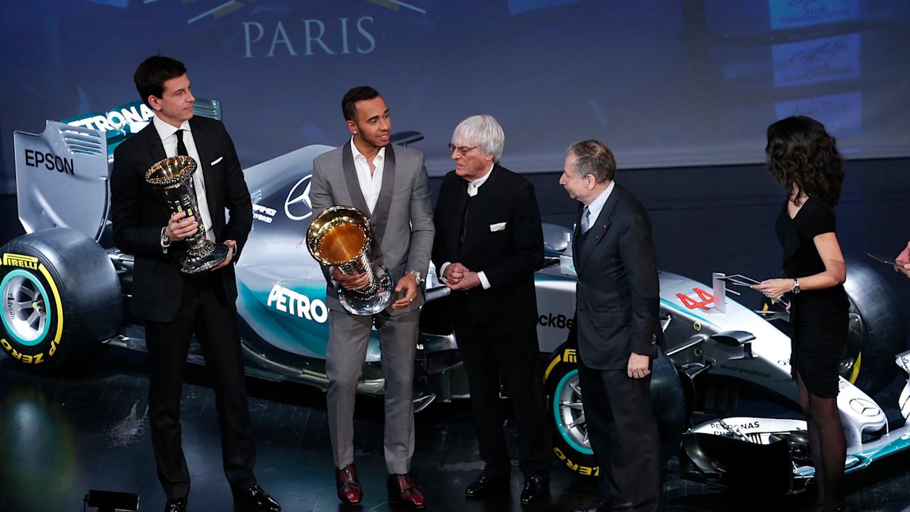 Mercedes' Lewis Hamilton and Toto Wolff, with FIA President Jean Todt and Formula One group CEO Bernie Ecclestone, portrait during the FIA Prize Giving 2015 on December 4th 2015, at Paris, France. © FIA
