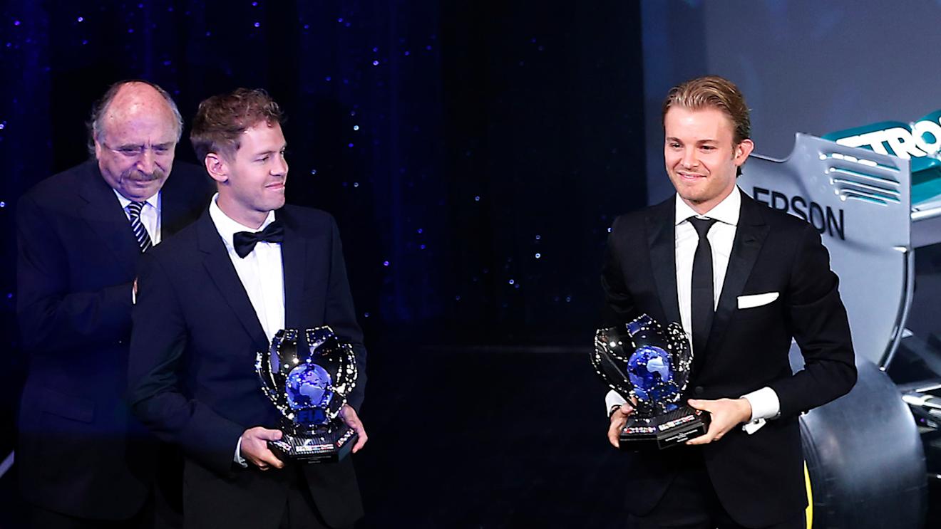 Sebastian Vettel (GER) Ferrari and Nico Rosberg (GER) Mercedes AMG F1 at FIA Prize Giving Awards Ceremony 2015, Paris, France, 4 December 2015. © FIA