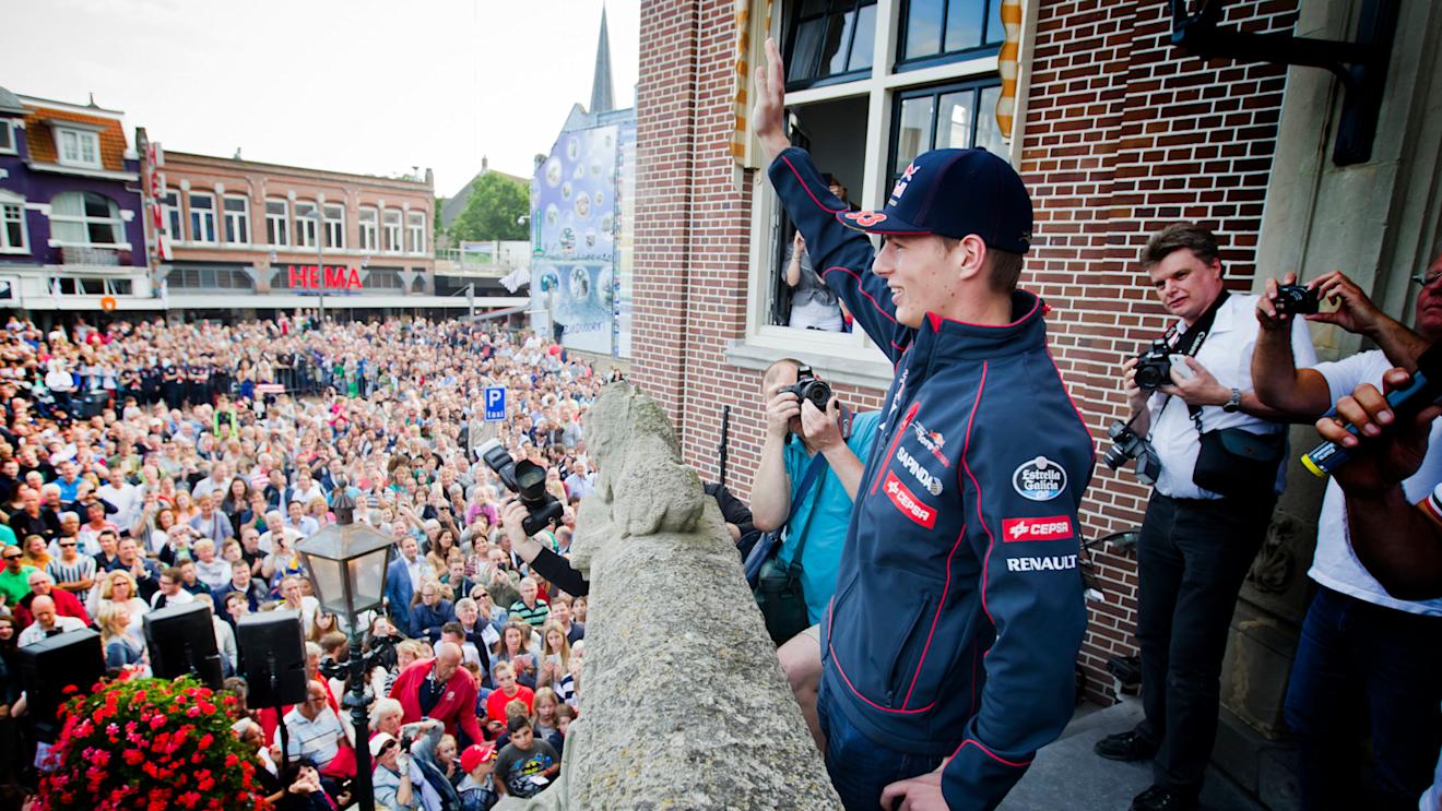 Max Verstappen thronged by fans in the centre of Zandvoort © Chris Schotanus