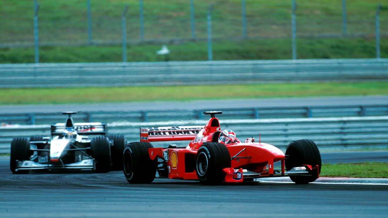 Michael Schumacher(GER) Ferrari F399 leads Hakkinen
Malaysian GP, Sepang, 17 October 1999 © ©Sutton Motorsport Images