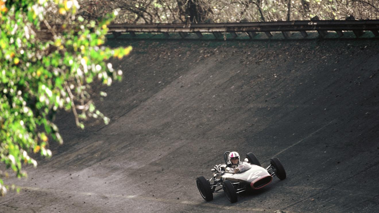 Actor James Garner, aka Pete Aron, on the famous banking at Monza during a promotional photo shoot © LAT Photographic