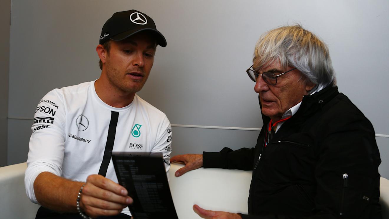 Mercedes' Nico Rosberg in conversation with Formula One group CEO Bernie Ecclestone, Monaco, May 21, 2015 © xpbimages.com