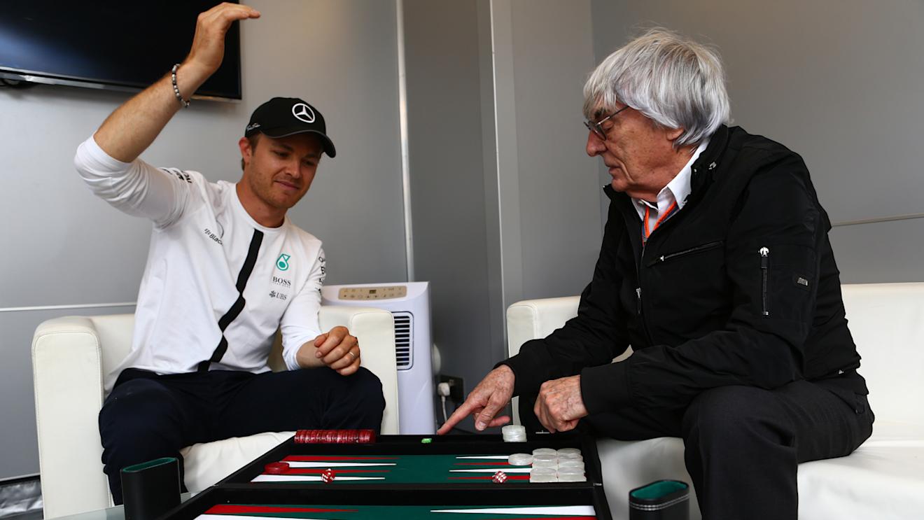 Mercedes' Nico Rosberg in conversation with Formula One group CEO Bernie Ecclestone, Monaco, May 21, 2015 © xpbimages.com