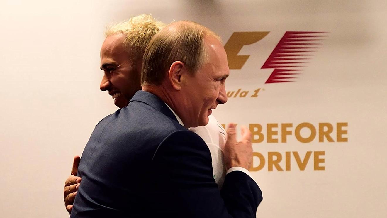 Russian President Vladimir Putin with Mercedes' Lewis Hamilton at the 2015 Formula 1 Russian Grand Prix in Sochi. © Mario Renzi