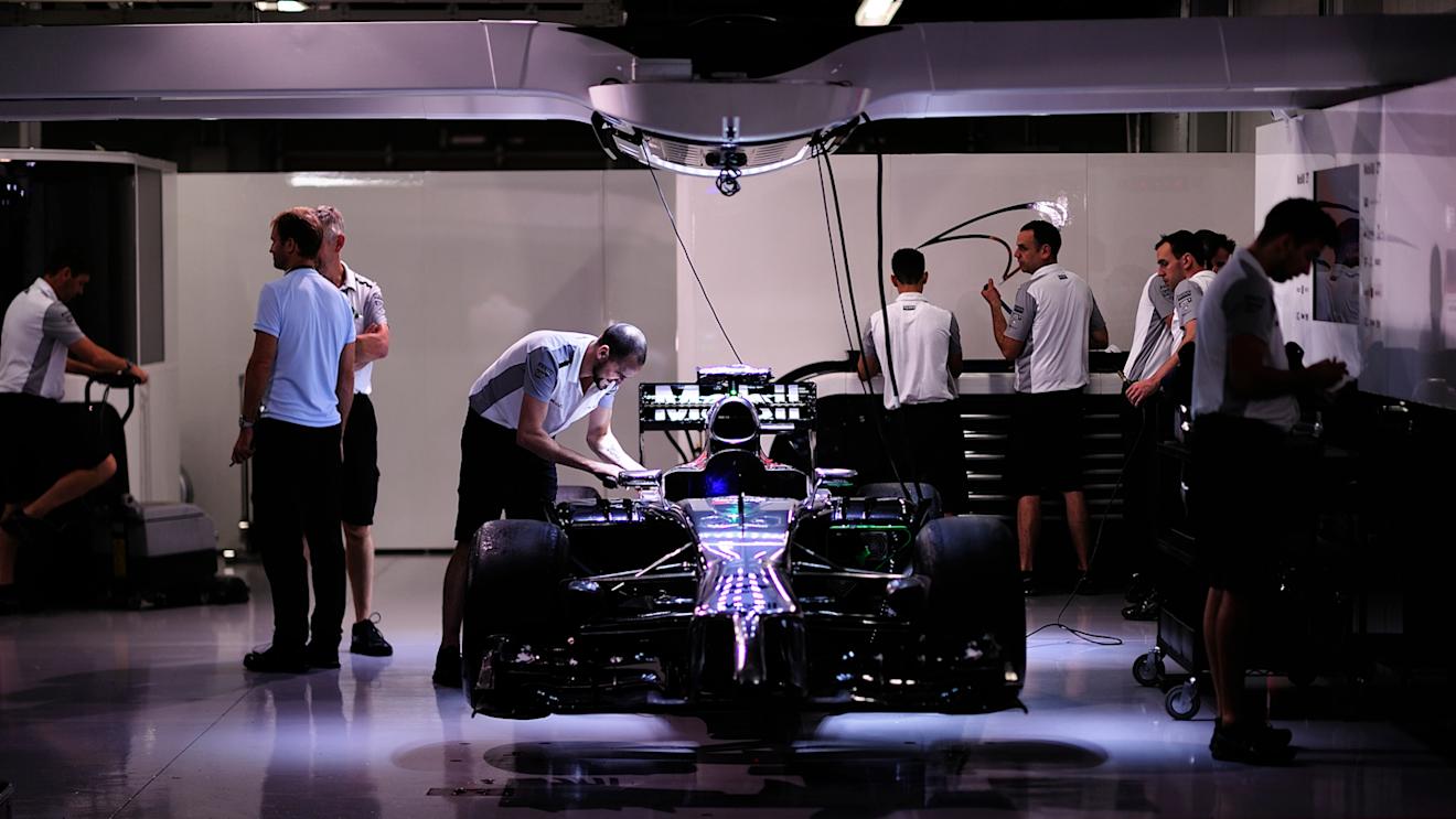 Evening preparations in the McLaren garage © FOWC Ltd