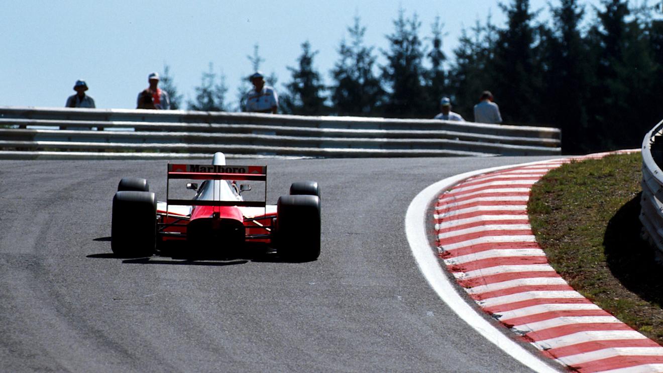 Gerhard Berger tackles Eau Rouge in 1990. Note the steepness of the hill. ©Sutton Motorsport Images