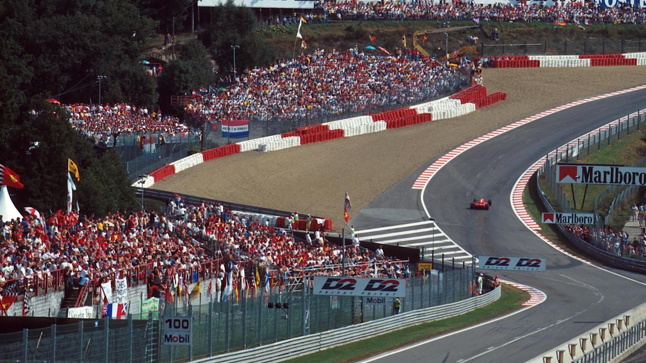 Winner Michael Schumacher (Ferrari F310B) takes the famous Eau Rouge corner during the 1997 Belgian Grand Prix. ©Sutton Motorsport Images