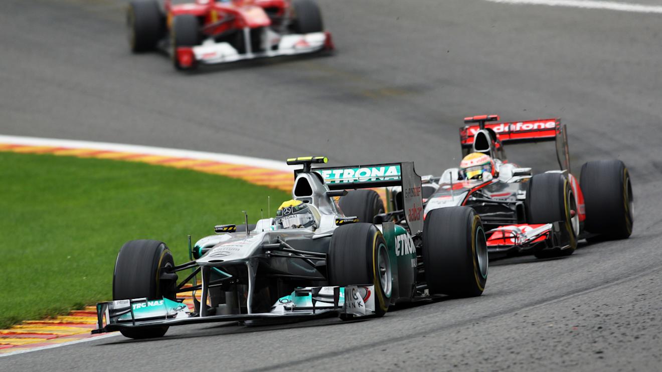 Nico Rosberg (Mercedes) battles with Lewis Hamilton (McLaren) through Eau Rouge. 2011 Belgian Grand Prix. © © Sutton Motorsport Images
