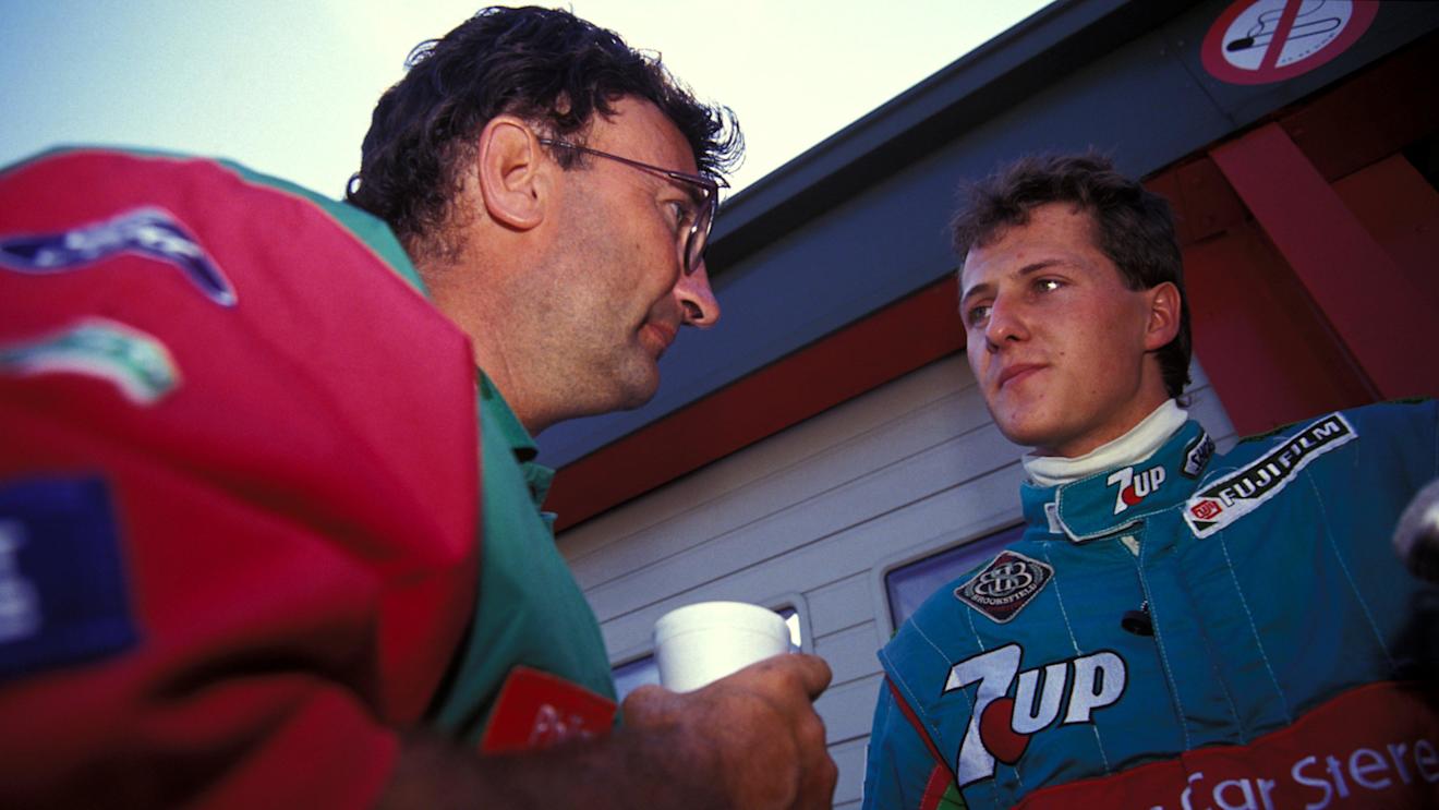 Michael Schumacher (GER) Jordan talks with Eddie Jordan (IRL) Jordan Team owner. 

Formula One World Championship. Belgium Grand Prix, Spa, Belgium. 25 August 1991. © Sutton Motorsport Images