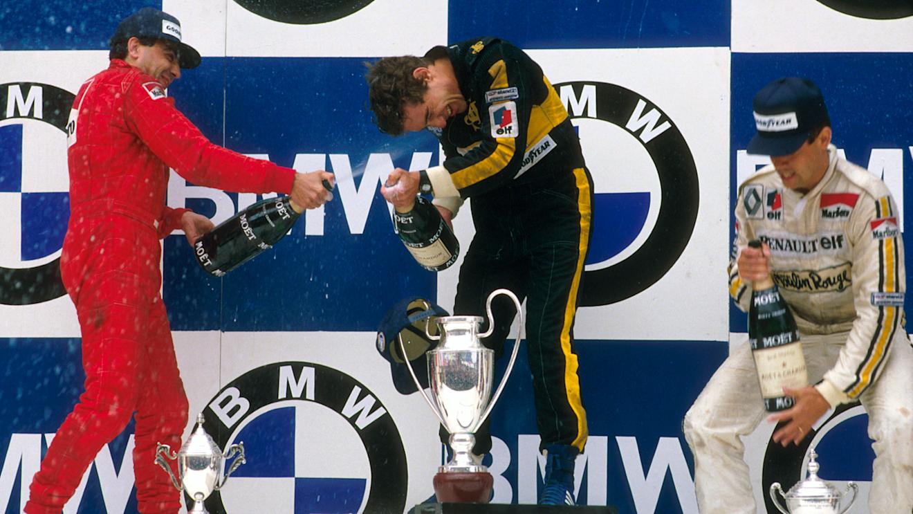 Ayrton Senna (Team Lotus) 1st position, Michele Alboreto (Ferrari) 2nd position and Patrick Tambay (Equipe Renault) 3rd position on the podium. Copyright - LAT Photographic