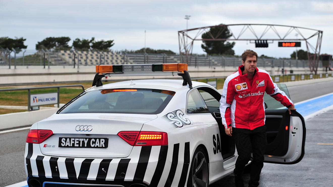 Sebastian Vettel (GER) Ferrari and safety car at Pirelli Formula One Wet Test, Day Two, Paul Ricard, France, 26 January 2016. © Sutton Motorsport Images
