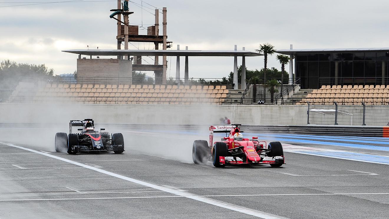 Sebastian Vettel (GER) Ferrari SF15-T leads Stoffel Vandoorne (BEL) McLaren MP4-30 at Pirelli Formula One Wet Test, Day Two, Paul Ricard, France, 26 January 2016. © Sutton Motorsport Images