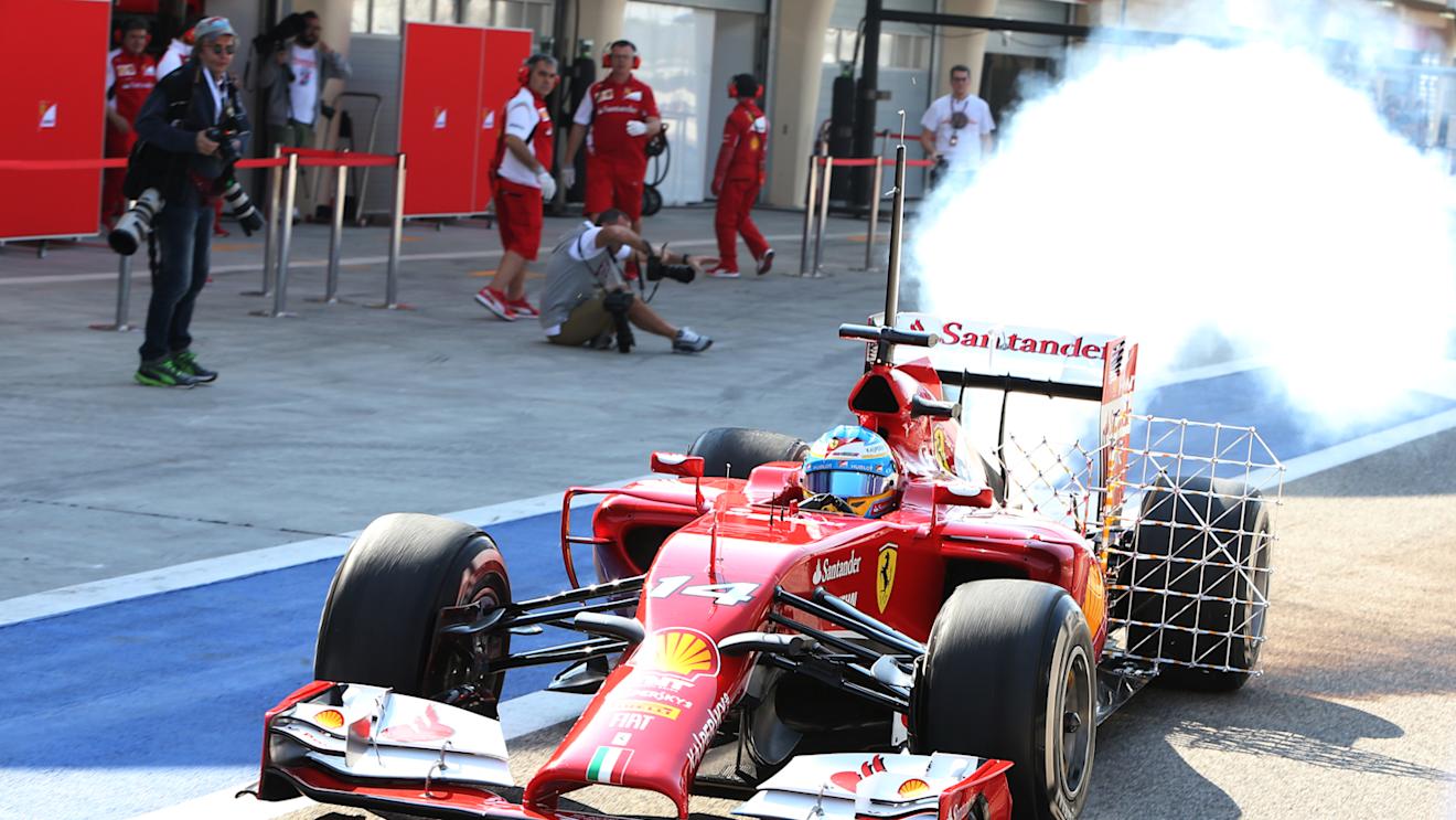 Fernando Alonso (ESP) Ferrari and smoke. Formula One Testing, Day One, Bahrain International Circuit, Sakhir, Bahrain, Wednesday, 19 February 2014 © Sutton Images. No reproduction without permission