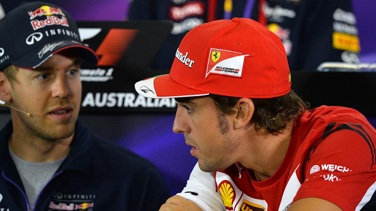 Sebastian Vettel (GER) Red Bull Racing and Fernando Alonso (ESP) Ferrari in the Press Conference. Formula One World Championship, Rd1, Australian Grand Prix, Preparations, Albert Park, Melbourne, Australia, Thursday, 13 March 2014 © Sutton Images. No reproduction without permission