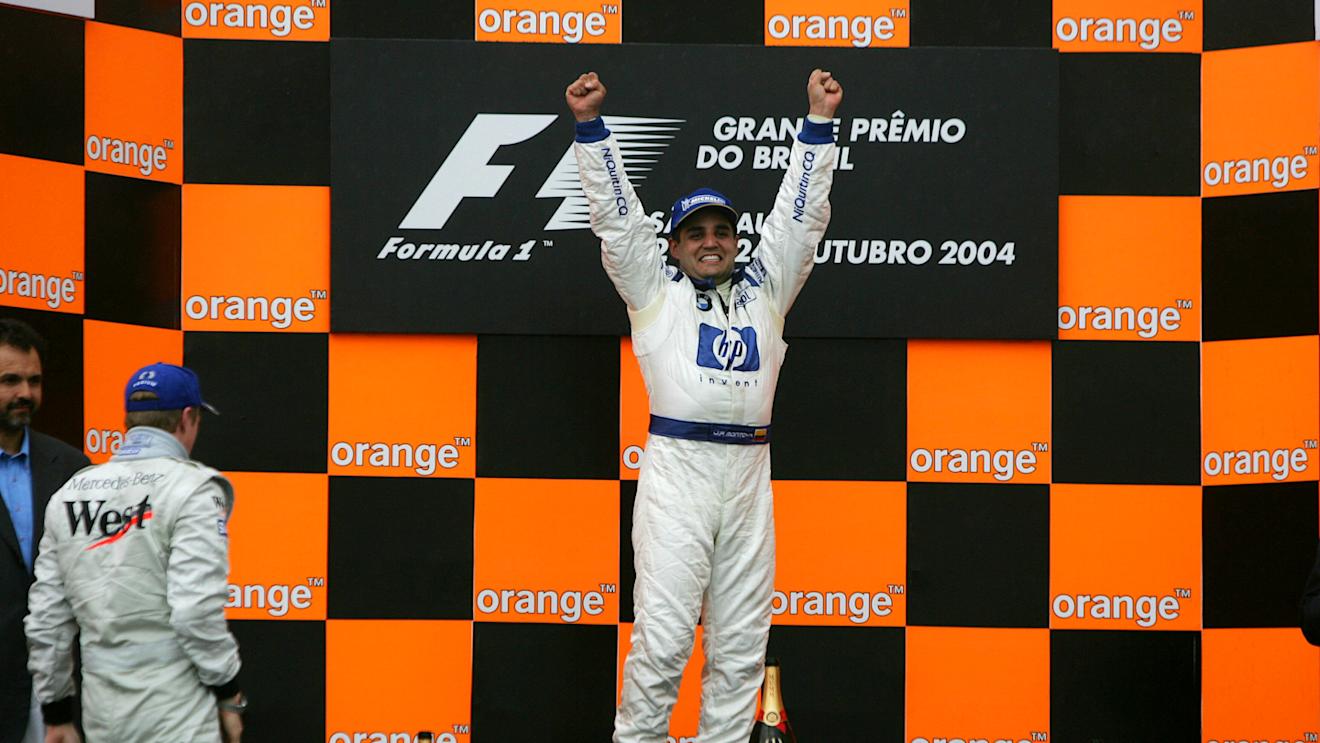 Juan Pablo Montoya (COL) Williams on the podium. Formula One World Championship, Rd18, Brazilian Grand Prix, Race Day, Interlagos, Brazil, 24 October 2004 