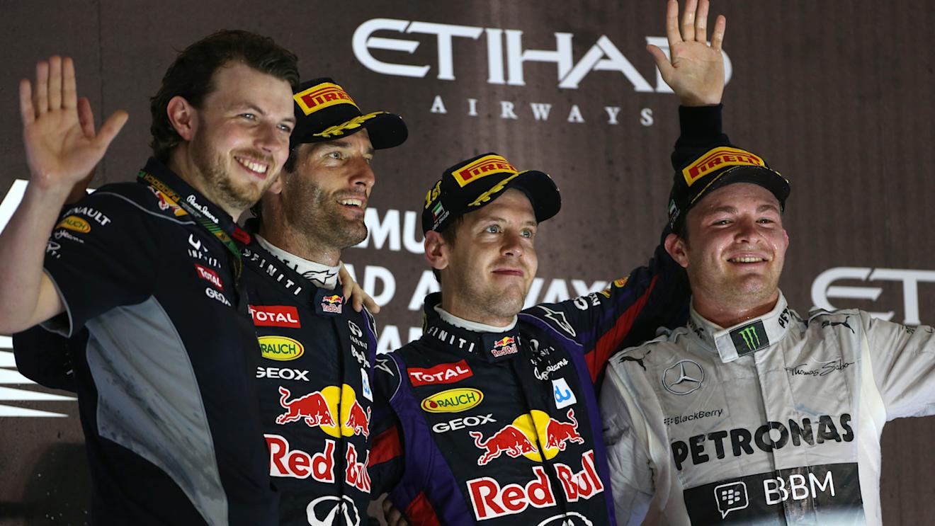 (L to R): Gavin Ward (GBR) Red Bull Racing Performance Engineer, Mark Webber (AUS) Red Bull Racing, race winner Sebastian Vettel (GER) Red Bull Racing and Nico Rosberg (GER) Mercedes AMG F1 celebrate on the podium. Formula One World Championship, Rd17, Abu Dhabi 