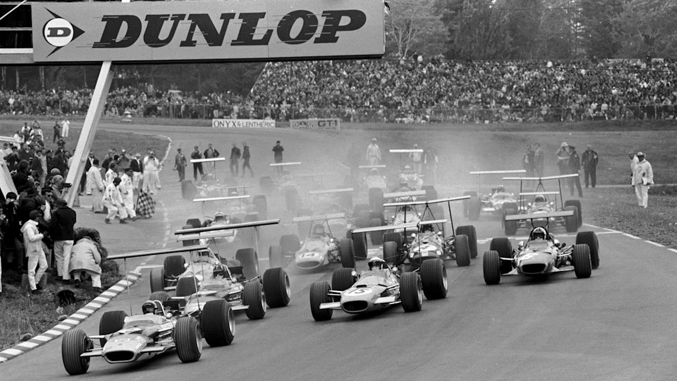 Pole position man Mario Andretti (USA) Lotus 49B gets away ahead of Graham Hill(GBR) Lotus 49B and eventual winner Jackie Stewart(GBR) Matra MS10 US GP, Watkins Glen, 6 October 1968 © Sutton Images. No reproduction without permission