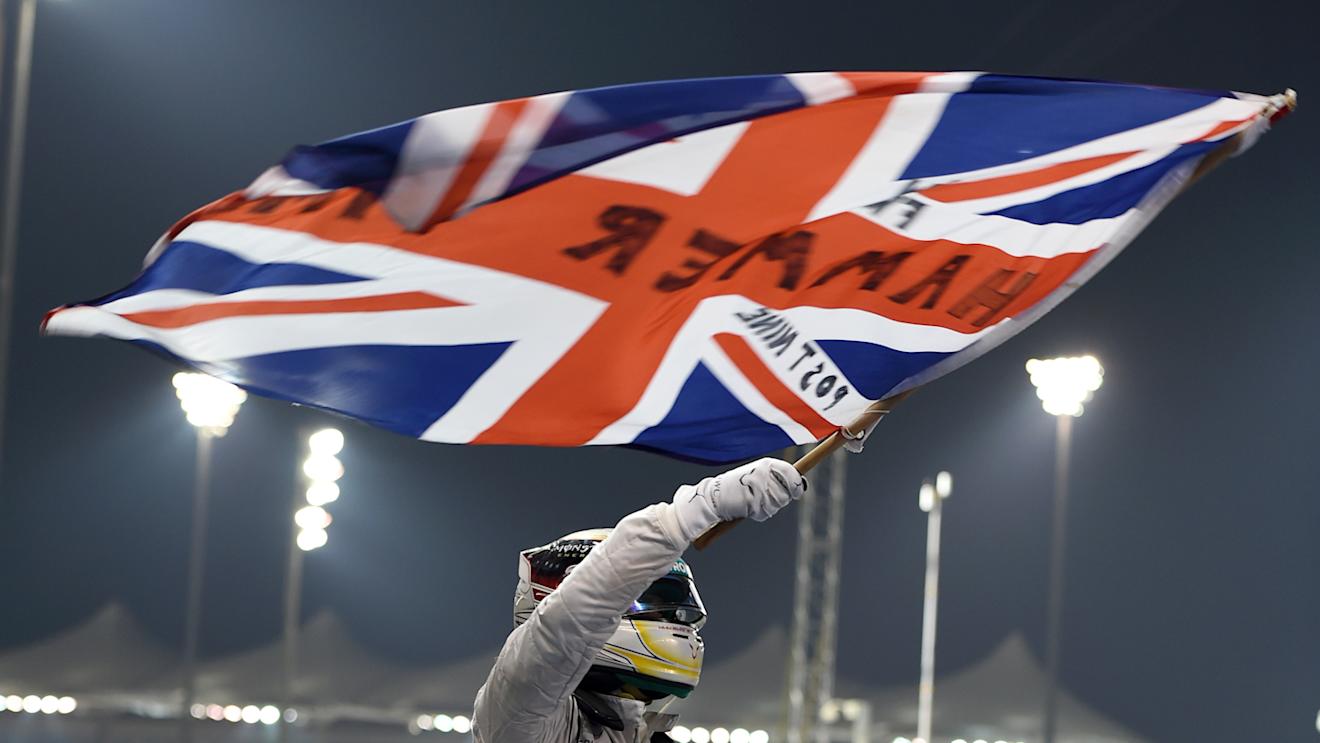Race winner and World Champion Lewis Hamilton (GBR) Mercedes AMG F1 celebrates in parc ferme. Formula One World Championship, Rd19, Abu Dhabi Grand Prix, Race, Yas Marina Circuit, Abu Dhabi, UAE, Sunday, 23 November 2014