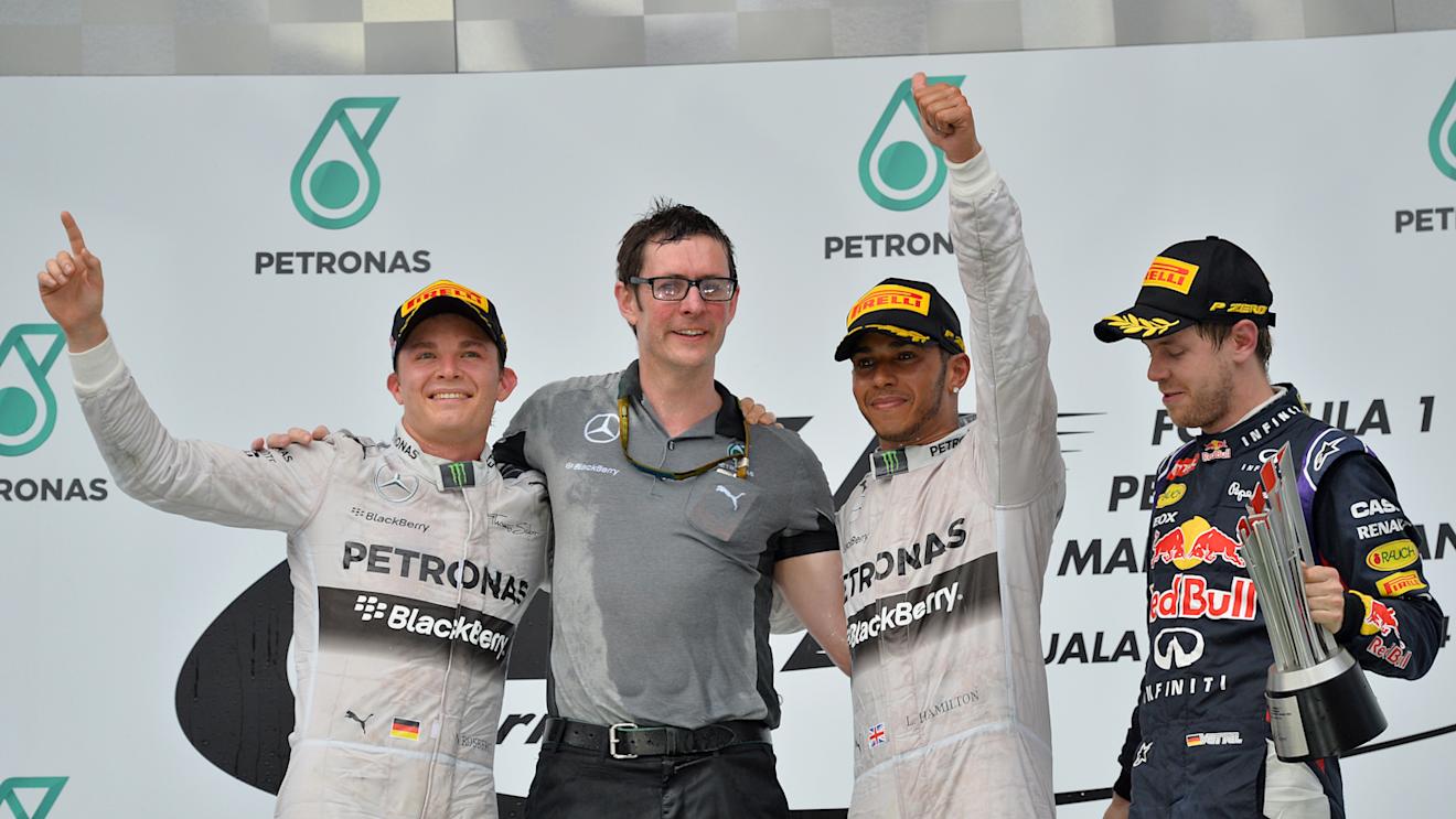 (L to R): Nico Rosberg (GER) Mercedes AMG F1, Andy Shovlin (GBR) Mercedes AMG F1 Chief Engineer, race winner Lewis Hamilton (GBR) Mercedes AMG F1 and Sebastian Vettel (GER) Red Bull Racing celebrate on the podium. Formula One World Championship, Rd2, Malaysia