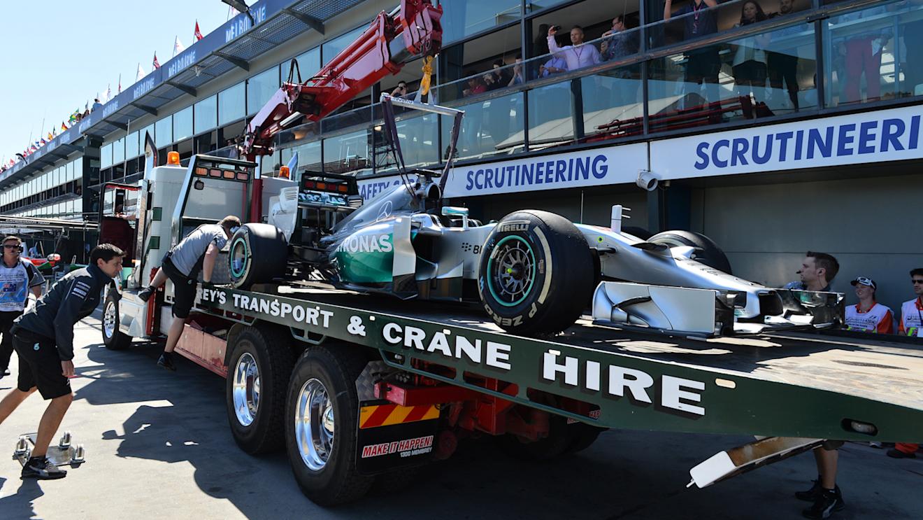 The car of Lewis Hamilton (GBR) Mercedes AMG F1 W05 is recovered to the pits. Formula One World Championship, Rd1, Australian Grand Prix, Practice, Albert Park, Melbourne, Australia, Friday, 14 March 2014