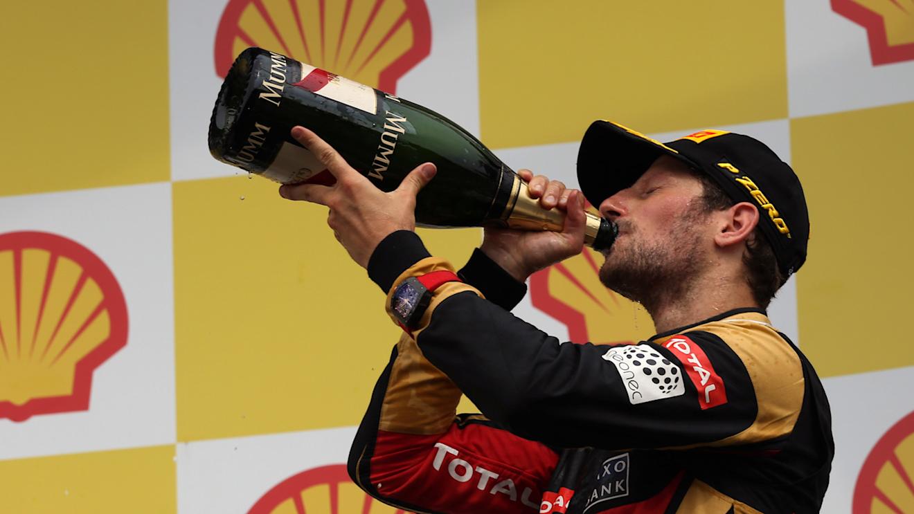 Romain Grosjean (FRA) Lotus F1 celebrates with the champagne on the podium at Formula One World Championship, Rd11, Belgian Grand Prix, Race, Spa Francorchamps, Belgium, Sunday 23 August 2015.
BEST IMAGE © Sutton Motorsport Images