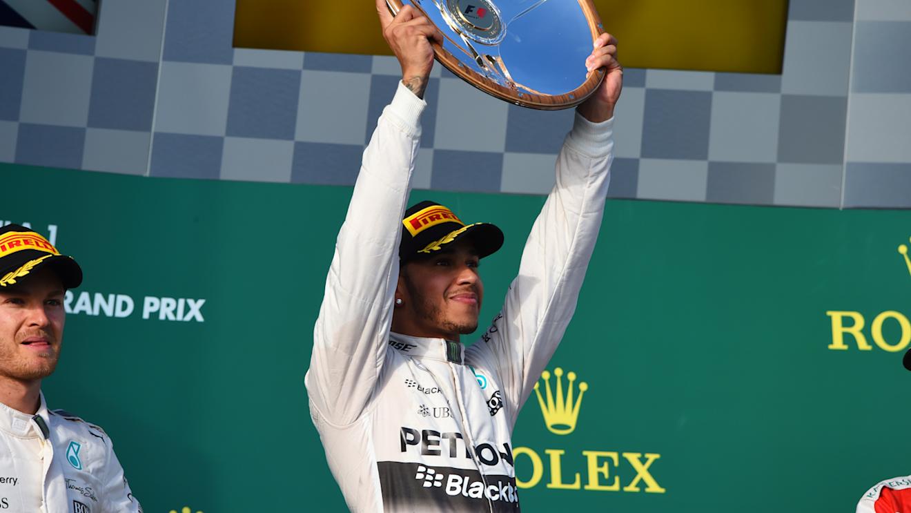 Race winner Lewis Hamilton (GBR) Mercedes AMG F1 celebrates with the trophy on the podium at Formula One World Championship, Rd1, Australian Grand Prix, Race, Albert Park, Melbourne, Australia, Sunday 15 March 2015. © Sutton Motorsport Images