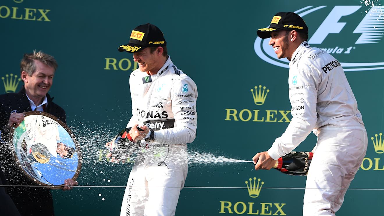 Lewis Hamilton (GBR) and Nico Rosberg (GER) on the podium. Formula One World Championship, Rd1, Australian Grand Prix, Race, Albert Park, Melbourne, Australia, Sunday 15 March 2015. © Sutton Motorsport Images