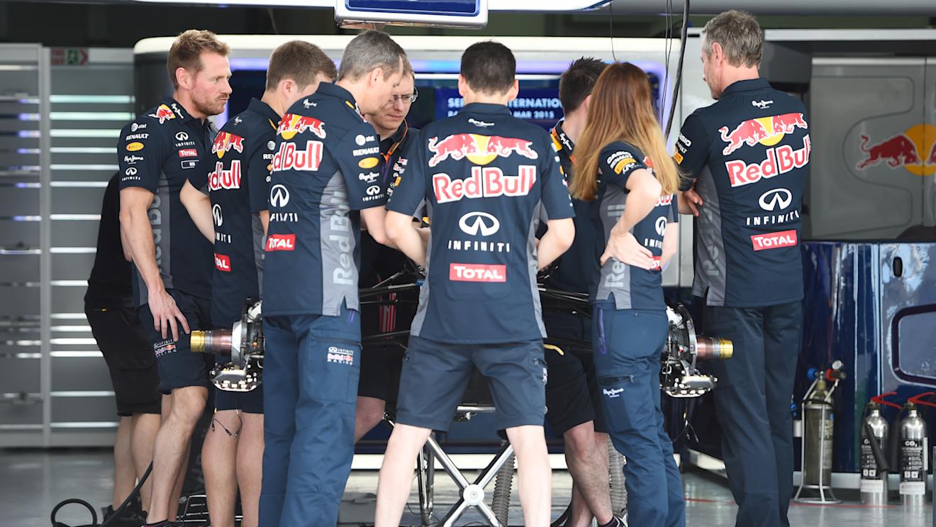 Red Bull Racing mechanics in the garage at Formula One World Championship, Rd2, Malaysian Grand Prix, Preparations, Sepang, Malaysia, Thursday 26 March 2015.
