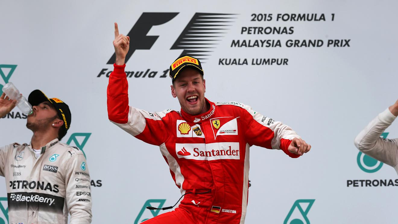 Race winner Sebastian Vettel (GER) Ferrari celebrates on the podium at Formula One World Championship, Rd2, Malaysian Grand Prix, Race, Sepang, Malaysia, Sunday 29 March 2015. © Sutton Motorsport Images