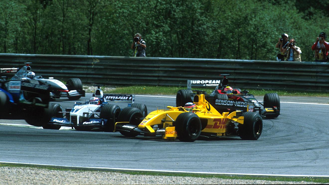 Nick Heidfeld's out-of-control Sauber can be spotted to the left of this picture as he lurches towards Takuma Sato's hapless Jordan. Austrian Grand Prix A1 Ring Austria. 12 May 2002. © Sutton Motorsport Images 