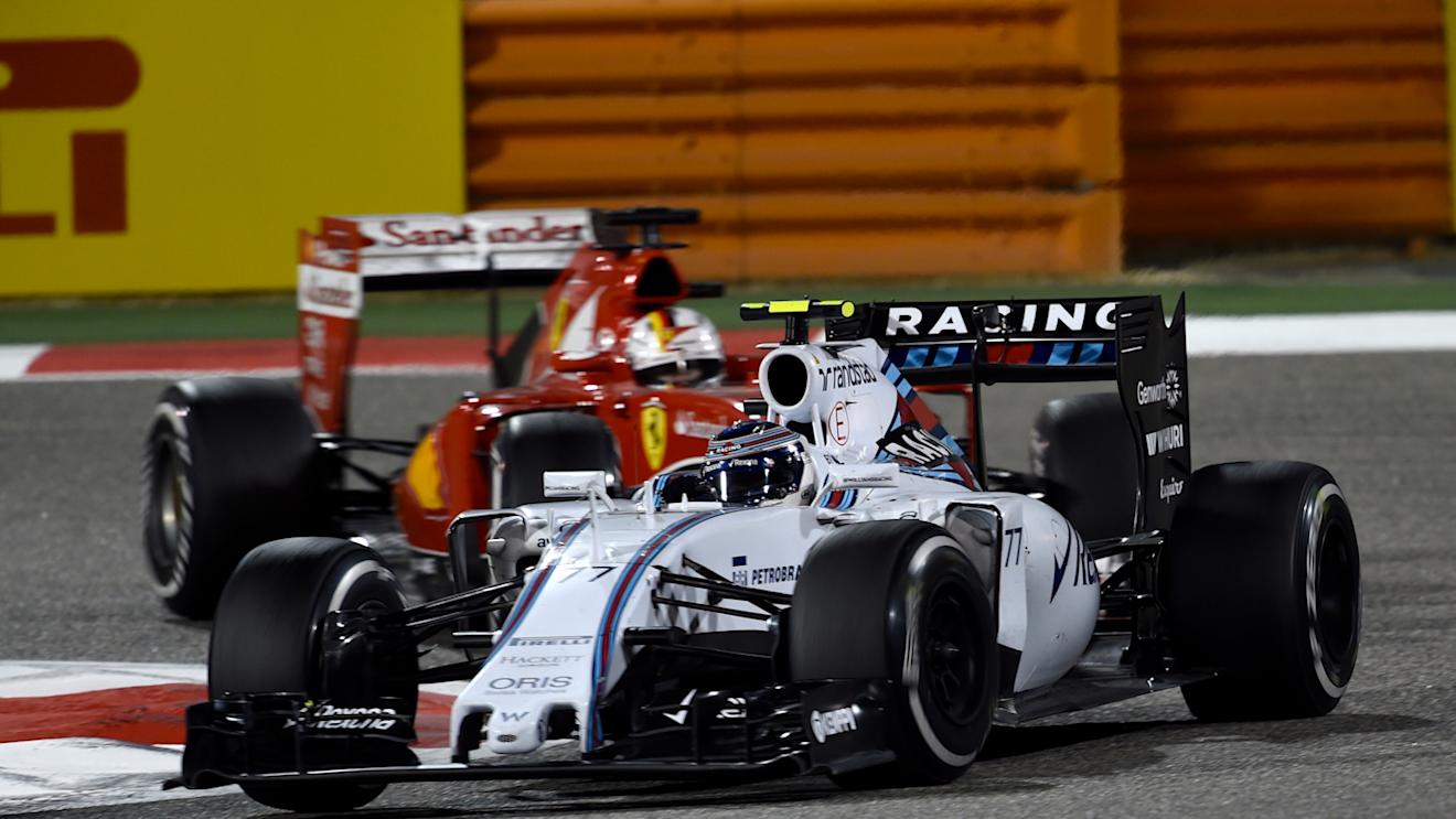 Valtteri Bottas (FIN) Williams FW37 and Sebastian Vettel (GER) Ferrari SF15-T at Formula One World Championship, Rd4, Bahrain Grand Prix Race, Bahrain International Circuit, Sakhir, Bahrain, Sunday 19  April 2015. © Sutton Motorsport Images