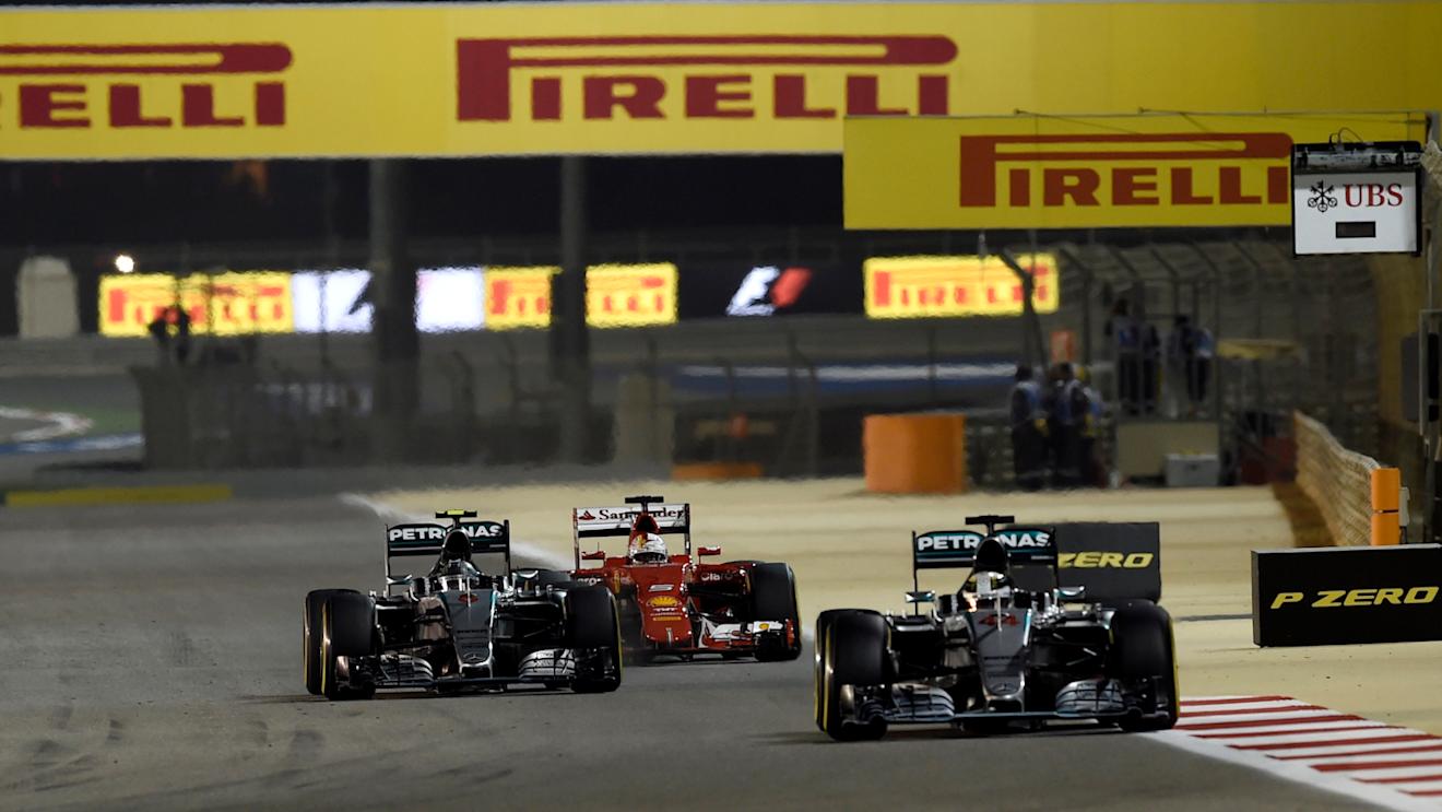 Lewis Hamilton (GBR) Mercedes AMG F1 W06 leads Nico Rosberg (GER) Mercedes AMG F1 W06 and Sebastian Vettel (GER) Ferrari SF15-T at Formula One World Championship, Rd4, Bahrain Grand Prix Race, Bahrain International Circuit, Sakhir, Bahrain, Sunday 19  April 2015. © Sutton Motorsport Images