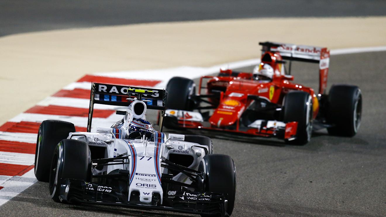 Valtteri Bottas (FIN) Williams FW37 and Sebastian Vettel (GER) Ferrari SF15-T at Formula One World Championship, Rd4, Bahrain Grand Prix Race, Bahrain International Circuit, Sakhir, Bahrain, Sunday 19  April 2015. © Sutton Motorsport Images