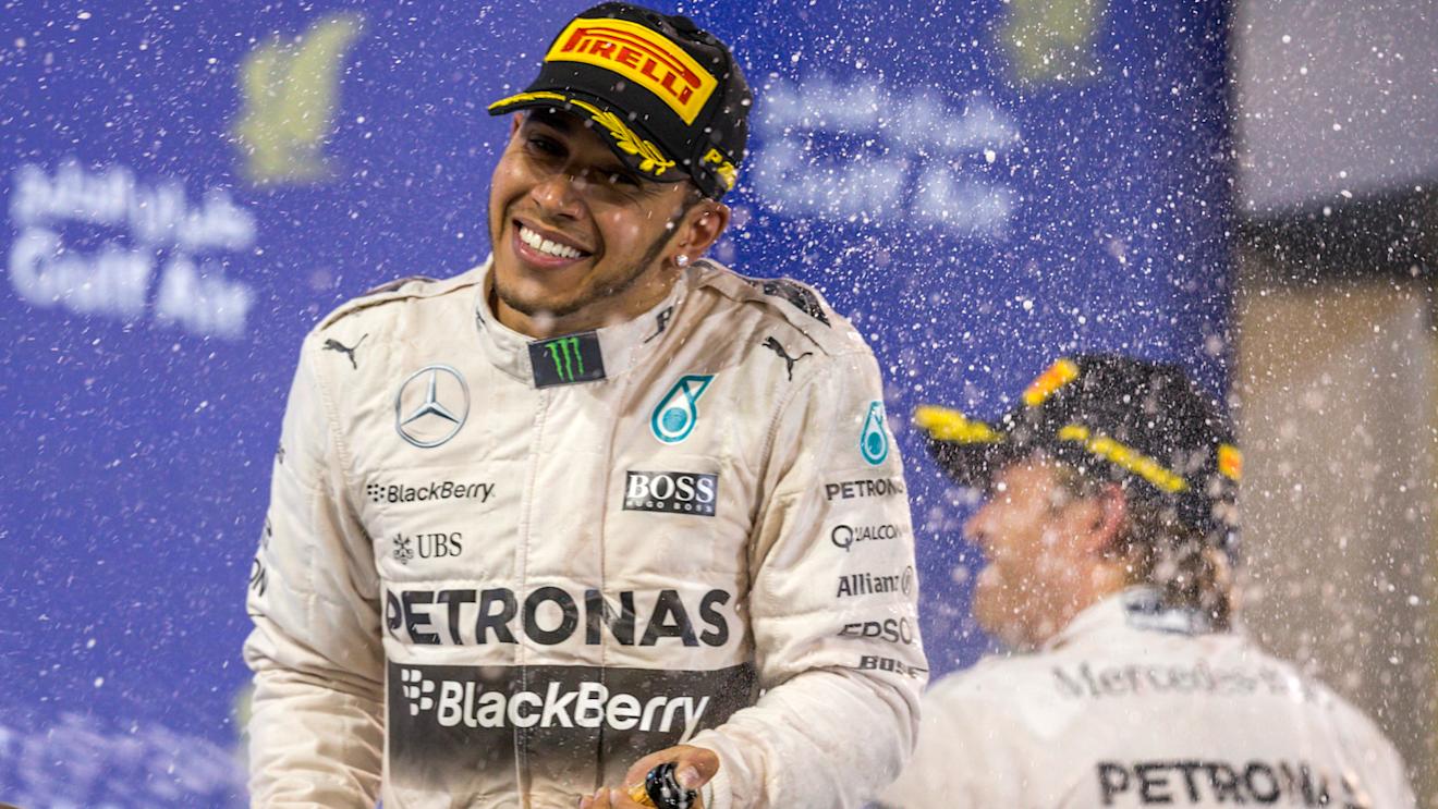 Lewis Hamilton (GBR) Mercedes AMG F1 and Nico Rosberg (GER) Mercedes AMG F1 celebrates on the podium at Formula One World Championship, Rd4, Bahrain Grand Prix Race, Bahrain International Circuit, Sakhir, Bahrain, Sunday 19  April 2015. © Sutton Motorsport Images