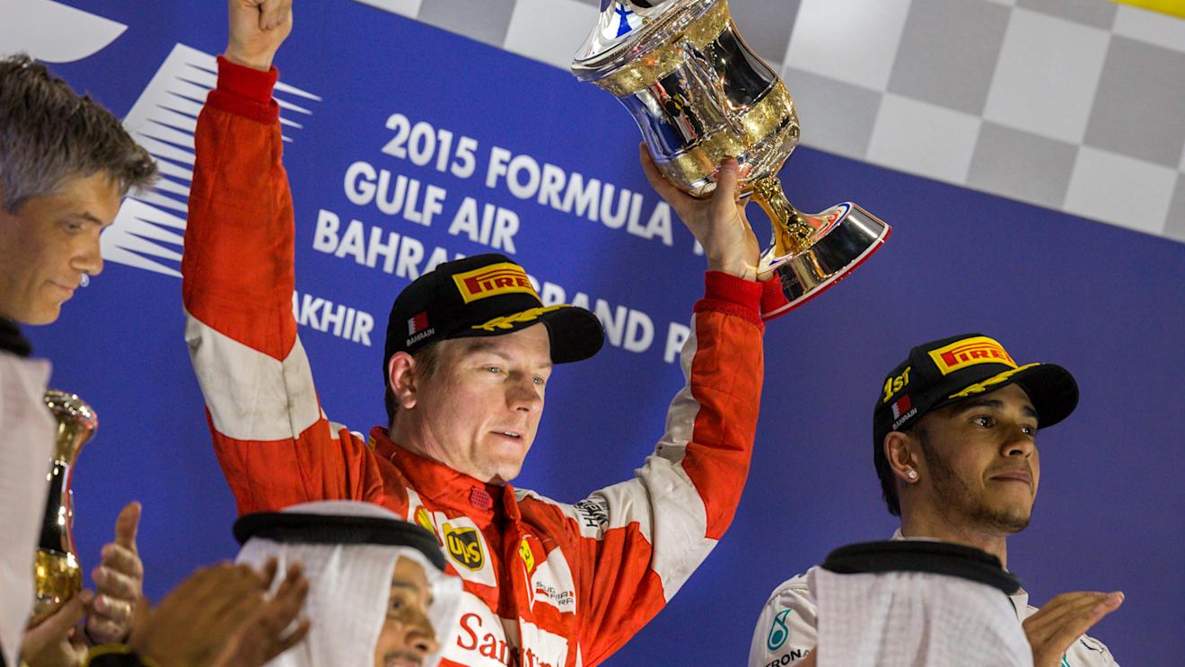 Kimi Raikkonen (FIN) Ferrari with the trophy on the podium at Formula One World Championship, Rd4, Bahrain Grand Prix Race, Bahrain International Circuit, Sakhir, Bahrain, Sunday 19  April 2015. © Sutton Motorsport Images