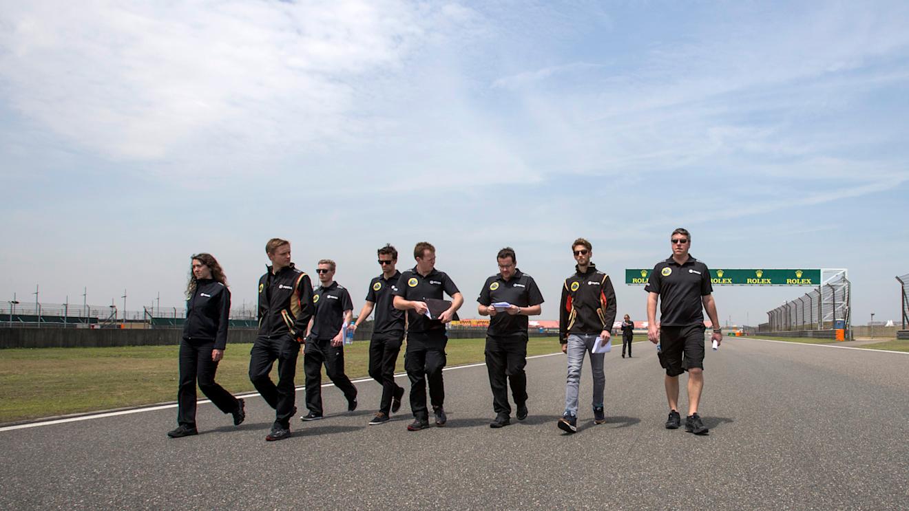 Jolyon Palmer (GBR) Lotus Test and Reserve Driver and Romain Grosjean (FRA) at Formula One World Championship, Rd3, Chinese Grand Prix, Preparations, Shanghai, China, Thursday 9 April 2015. © Sutton Motorsport Images