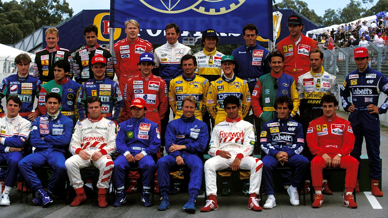 Senna (second row, fourth from left) and Irvine (second row, far left) were rightly kept apart from each other during the traditional end of season photograph in Australia following their bust-up in Japan. © Sutton Motorsport Images