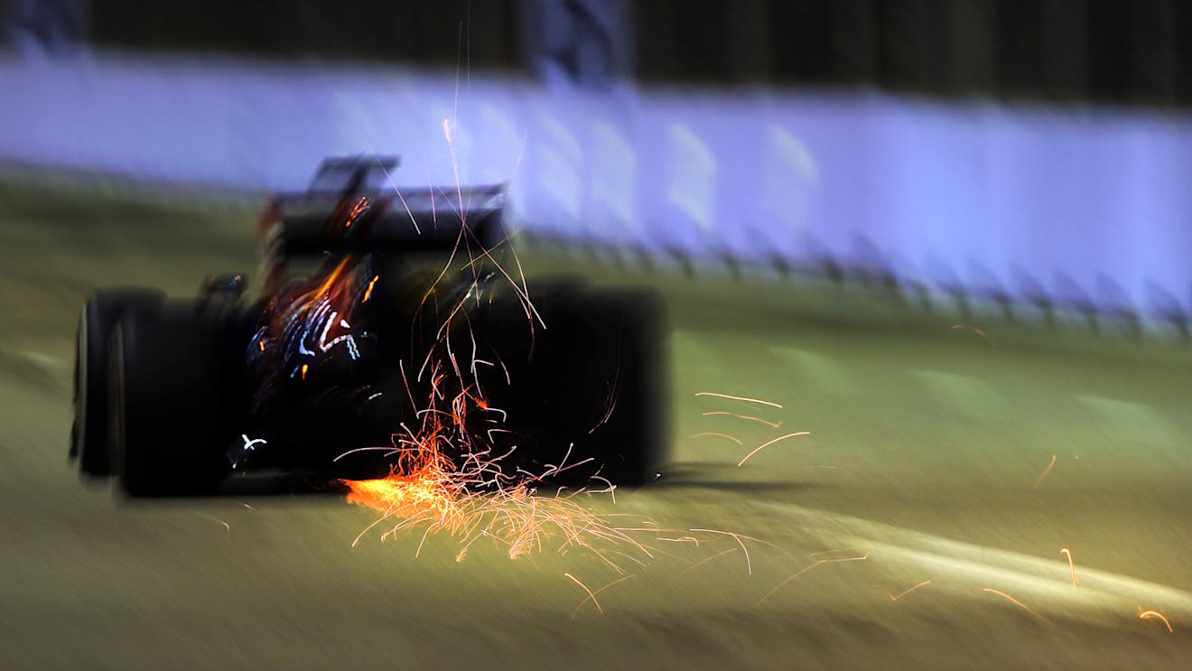 Like any street track, the surface in Singapore is not particularly smooth, contributing to many sparky moments like this. © Sutton Motorsport Images