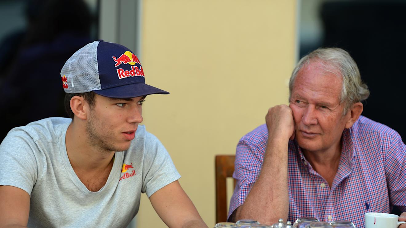 Pierre Gasly and Red Bull motorsport advisor Helmut Marko. Formula One Testing, Yas Marina Circuit, Abu Dhabi, UAE, Wedensday 26 November 2014. © Sutton Motorsport Images