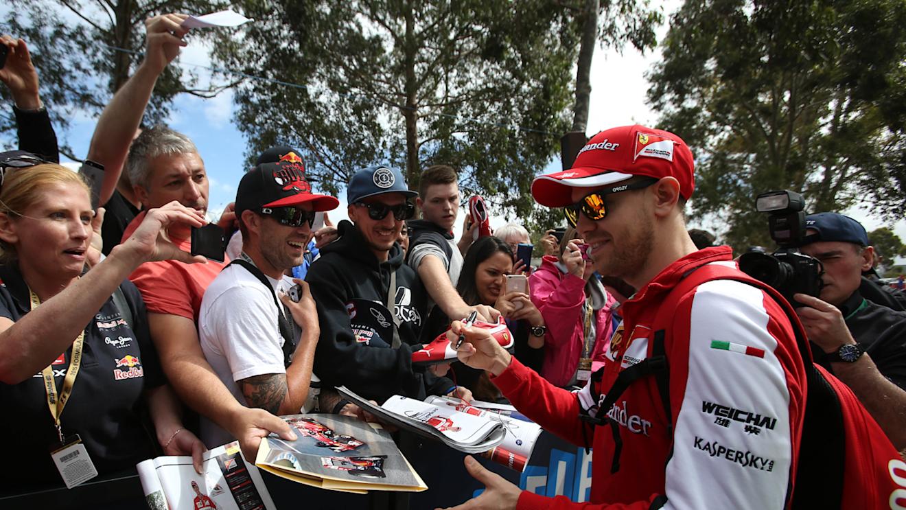 Sebastian Vettel (GER) Ferrari signs autographs for the fans at Formula One World Championship, Rd1, Australian Grand Prix, Preparations, Albert Park, Melbourne, Australia, Thursday 12 March 2015. © Sutton Motorsport Images