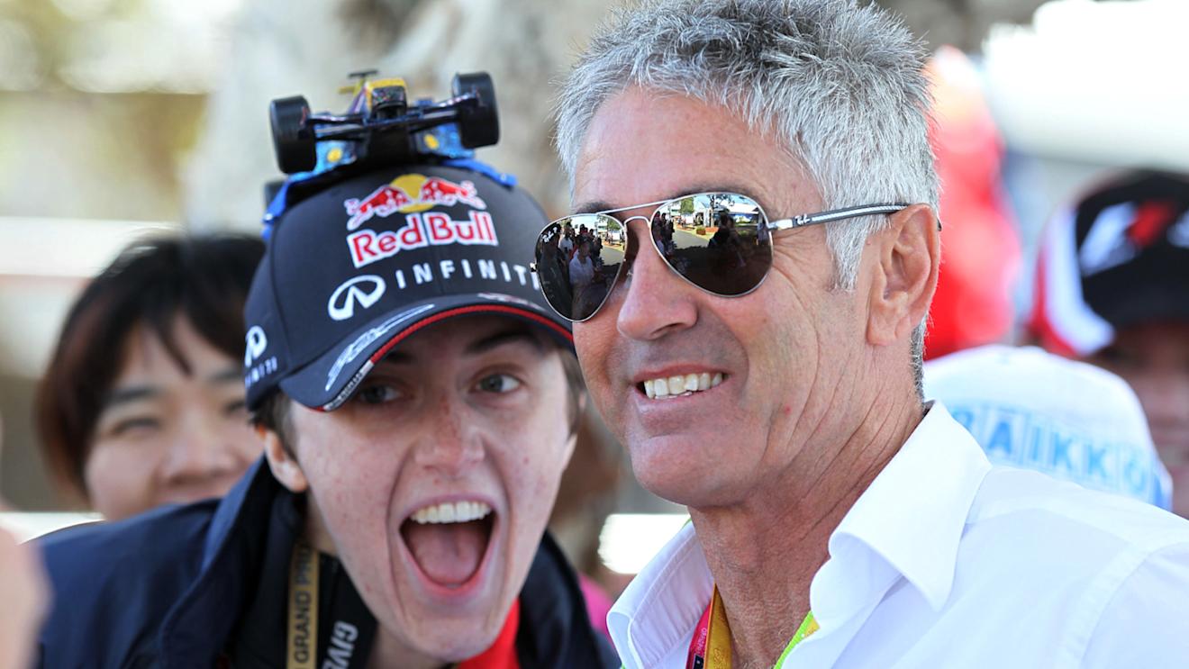 MotoGP Legend Mick Doohan (AUS) and fan at Formula One World Championship, Rd1, Australian Grand Prix, Race, Albert Park, Melbourne, Australia, Sunday 15 March 2015. © Sutton Motorsport Images