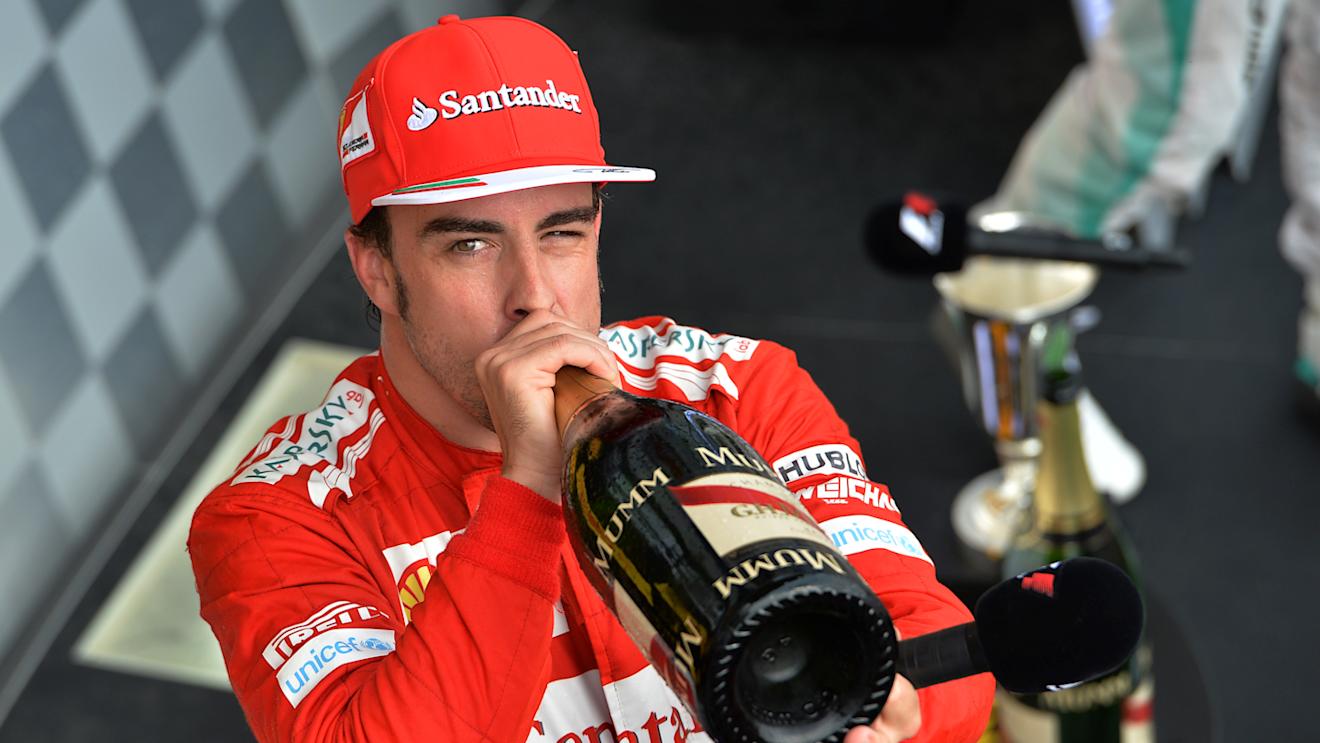 Second placed finisher Fernando Alonso (ESP) Ferrari drinks champagne On the podium.
Formula One World Championship, Rd11, Hungarian Grand Prix, Race Day, Hungaroring, Hungary. Sunday 27 July 2014.