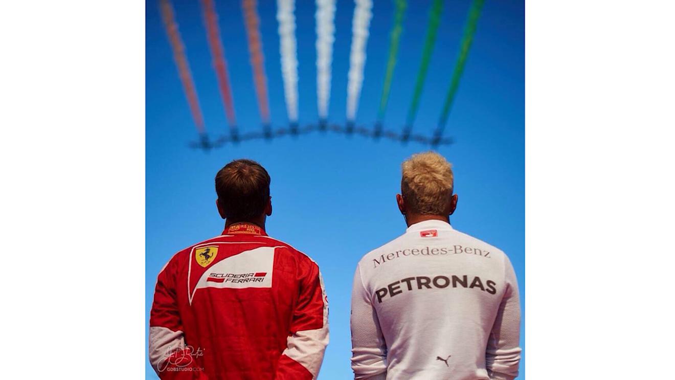Ferrari's Sebastian Vettel and Mercedes' Lewis Hamilton watch the aero display at Formula One World Championship, Rd12, Italian Grand Prix, Race, Monza, Italy, Sunday 6 September 2015. © Guido De Bortoli
