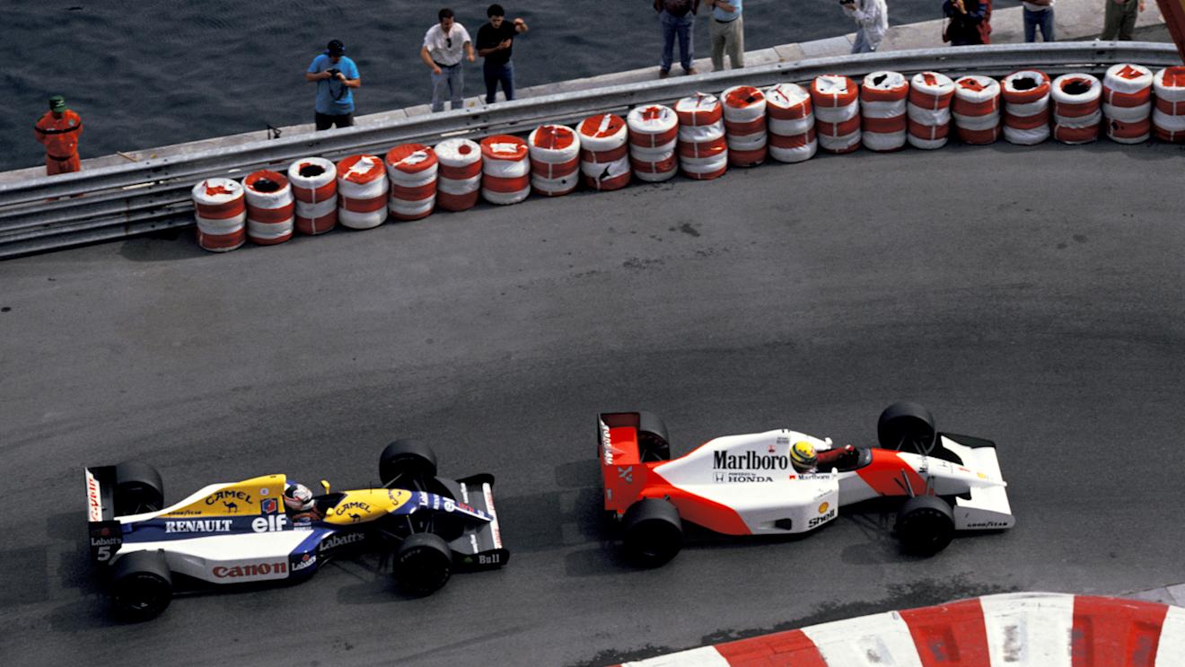 Ayrton Senna (BRA) McLaren MP4/7A manages to stay ahead of Nigel Mansell (GBR) Williams FW14B in a fierce battle at the end of the race.
Monaco Grand Prix, Monte-Carlo, 31 May 1992
 © Sutton Motorsport Images